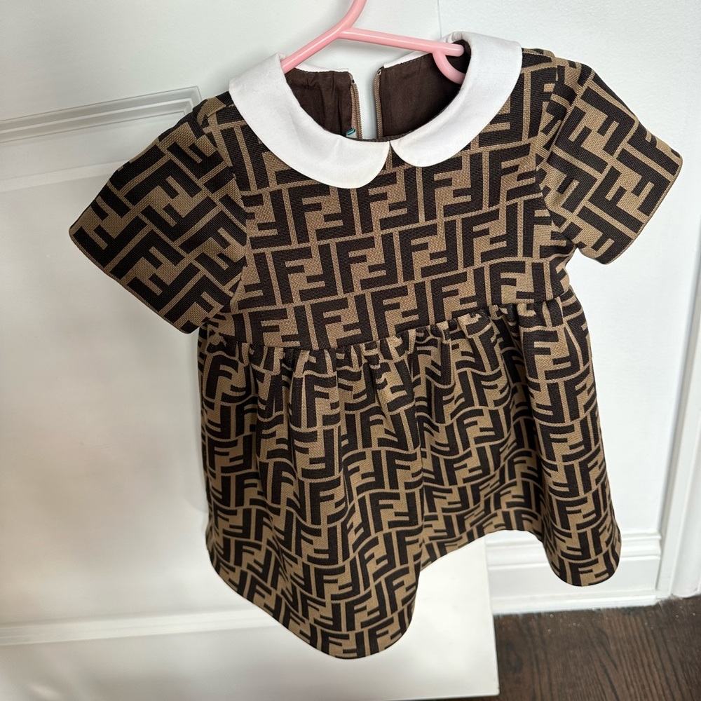 Toddlers fendi dress 12 months worn only once and comes with socks !